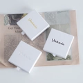 White sliding drawer jewelry gift box with gold, silver and black foil logo options - White