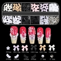 Macro view of 12-grid nail art kit featuring aurora bows, pearls and resin charms - Bow + Wings (12TZ-07)