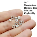Macro shot of 6mm silver gear spacer beads on fingertips showing small scale and size - 7# (Diameter 6mm/Gear)