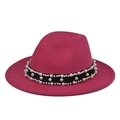 Close-up of fuchsia wool fedora hat featuring elegant faux pearl accents on a black band - Rose Red Fedora with Pearl Chain