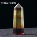 Natural yellow fluorite hexagonal crystal point with golden gradient on dark background - Yellow Fluorite / Single Point 4-5cm