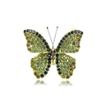Golden butterfly brooch with sparkling green crystals and elegant antennae on white background - YNCP4540 Green