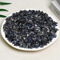 Polished dark blue and grey fluorite crystal stones in a white round ceramic plate - 100 Grams Of Iolite (5-7mm)