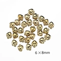 Dettaglio di ciondoli a cuore dorati 6x8mm per creazione di gioielli fai da te - 6x8mm/10g / Oro