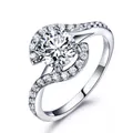 Elegant 925 sterling silver ring featuring a round main stone and spiral shank design - Size 5 / Round White Zirconia Style (RUJ009Z-1)