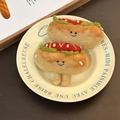 Handmade wool felt hot dog keychains featuring cute smiling faces and colorful details - Hot Dog Pair
