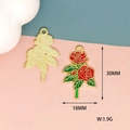 Macro detail of red rose enamel charm with dimensions 30mm x 18mm and golden metal back - 25 Chinese Rose