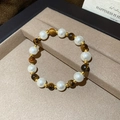 Detail of vintage tiger eye and pearl beaded bracelet with gold accents in a gift box - Pearl and Tiger Eye Combination (Style 1)