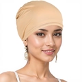 Close-up of soft and elastic beige turban hat worn by a smiling model on plain background - One Size / Khaki