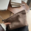 Macro detail of red plaid tweed makeup bag showing texture and zipper closure - Red Coffee Small Grid