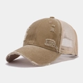 Detail view of khaki distressed trucker hat with vintage torn edges and mesh back - Adjustable / Khaki