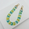 Yellow and blue gradient acrylic chain strap with gold lobster clasps on a white stand - 30cm Phone Chain / Translucent Blue Yellow