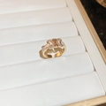 Detail of adjustable gold ring with white enamel and crystal encrusted geometric logo - 37# Gold Triomphe Double C Logo Open Ring