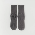 Dark gray mid-calf yoga socks featuring anti-slip silicone grips and YOGA SPORTS text - One Size / Dark Gray