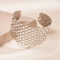 Adjustable wide cuff bracelet featuring retro woven texture in an antique metallic finish - Silver Woven Square Pattern Style