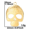 Detailed view showing the 30mm x 22mm dimensions and floral carving of the skull pendant - Pendant Only / Gold