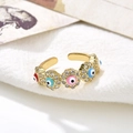 Macro detail of 18K gold plated open ring with colorful evil eye zircon patterns - Red Blue Pink Eye (ZYN-DMR56G-6)
