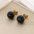 Macro shot of black faceted crystal stud earring on golden metallic surface - 10mm / Gold Base Black Faceted Crystal (KE116386-K)