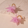Detail view of pink acrylic flower earrings with gold hooks on a stone display - 925 Sterling Silver Earring Post - Purple