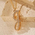 18K gold plated necklace featuring a capital G or J pendant with sparkling zircons - Letter G