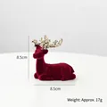 Christmas reindeer ornament in burgundy flocking with gold glitter antlers, 8.5cm size - Small Reclining Reindeer Statue