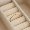 US 7 / Geflochtener Stil / Gold