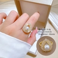 Close-up of golden geometric ring with white pearl and drop-shaped zircon crystals - Water Drop Pearl Adjustable Ring (G414)