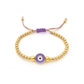 Golden beaded evil eye bracelet with purple pendant and adjustable braided cord - Purple Pendant
