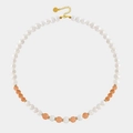 Detail of beaded necklace with white pearls, orange gemstones and golden lobster clasp - Pearl Orange Cat's Eye Necklace 38+5cm