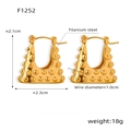 Detailed view of gold titanium steel earrings with dot texture and 2.1x2.3cm dimensions - Gold