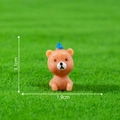 Miniature resin puppy figurine wearing a blue pointed hat in a brown sitting pose - 11# Little Bear