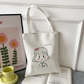 White Oxford tote bag with cute cartoon girl yummy print in a cozy artistic studio setting - White with Pink Face Girl