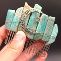 Detail of handmade moon and star hair comb with raw blue crystal quartz stones - Amazonite