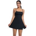 Close-up of black athletic dress featuring slim straps and side slit detail - Black