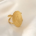 Detail of gold hammered stainless steel oval ring with embossed sunburst texture - Round / Gold