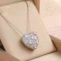 Silver heart pendant necklace with zircon stones on vintage letter background - Silver