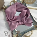 Close-up of a purple silk scarf tied in a bow on a vintage mirror with elegant decor - 15x150cm / Purple