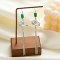 Detail of silver fan-shaped earrings with green beads and long tassels in Chinese style - Silver Folding Fan Bamboo Shadow Long Tassel (E5948)