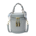 Light blue cylinder bucket bag with woven texture and scarf-wrapped handle detail - Blue