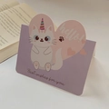 Pink greeting card featuring a cute cartoon unicorn cat inside a purple heart shape - Beautiful Cat