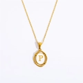 Detailed view of an oval gold pendant necklace featuring an engraved letter P on white inlay - Letter P - Gold