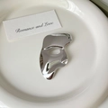Polished silver mask brooch with a mirror finish displayed on a white ceramic plate - 7# Silver Mask Shape Brooch