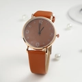 Elegant rose gold quartz watch with brown leather strap and clear numeric dial detail - Brown