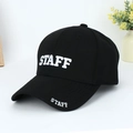 Close-up of STAFF white embroidery on black cotton-blend curved brim baseball cap - Black with White Letters