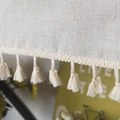 Detail of beige linen curtain fabric with elegant fringe tassels and rustic texture - 150x45cm / Slub Linen Tassel Hook Style Tier