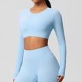 Close-up of the light blue yoga top featuring double-sided brushed fabric and built-in pads - S / Sky Blue