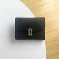 Women's black pebbled leather mini wallet with unique silver razor blade buckle - Black