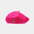 Detail of rose red wool beret with small pineapple embroidery and soft suede texture - One Size / Rose Red