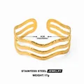 18k gold plated stainless steel cuff bracelet with textured wave pattern and adjustable open size - Gold Hammered Wave