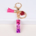 Fuchsia tassel and heart keychain with resin alphabet charm and pink glitter sequins - Letter I
